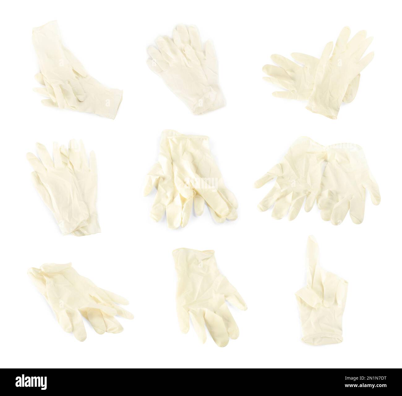 Satz medizinischer Handschuhe auf weißem Hintergrund Stockfoto