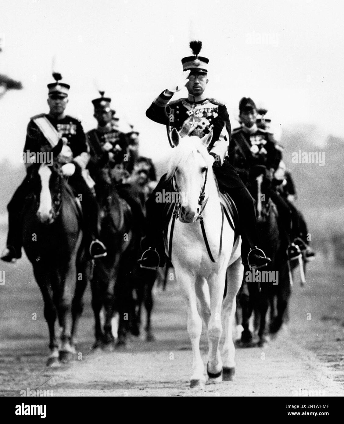 FILE In this 1937 file photo, Japan's Emperor Hirohito salutes from