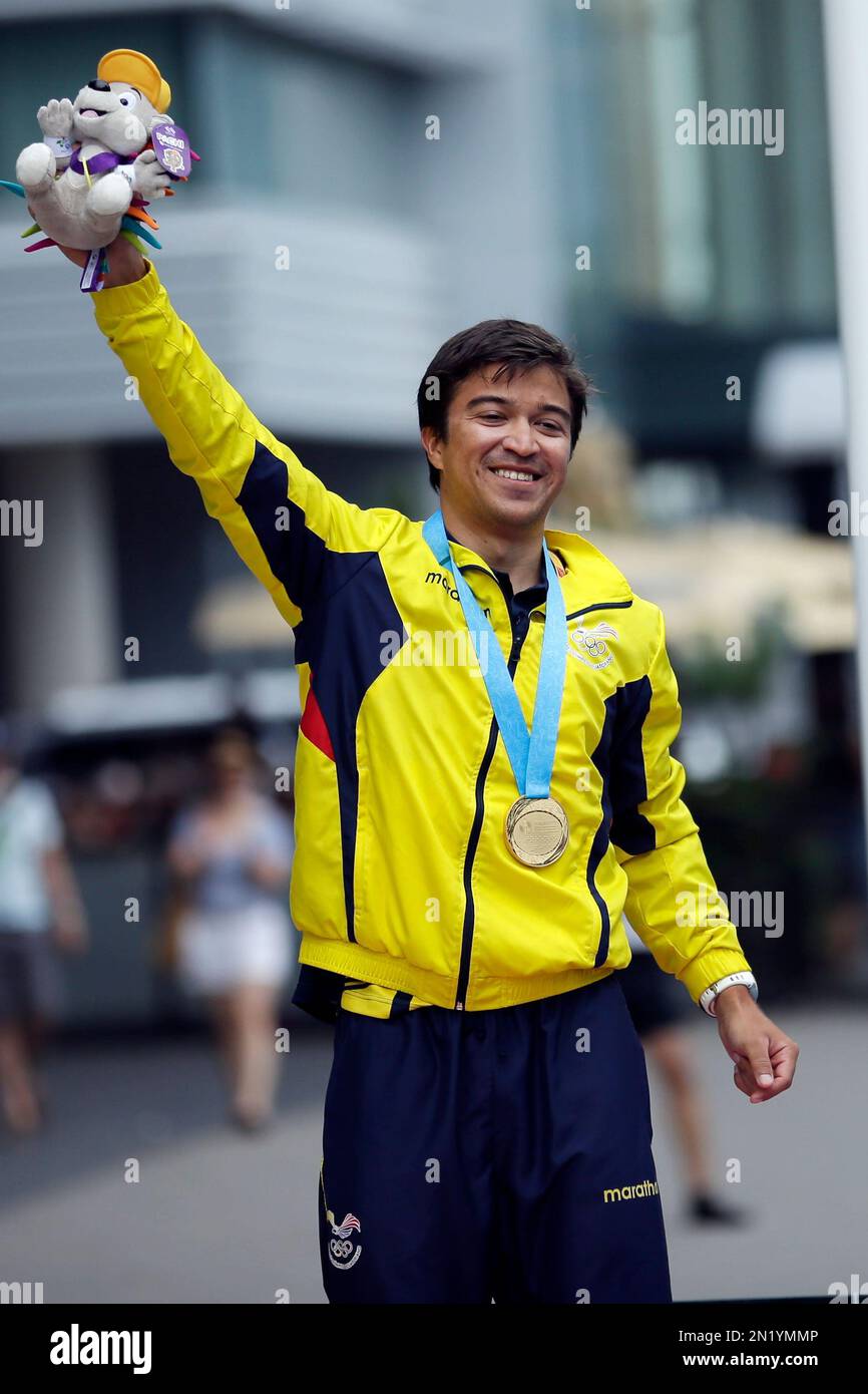 Ecuador's Jonathan celebrates after winning the gold medal