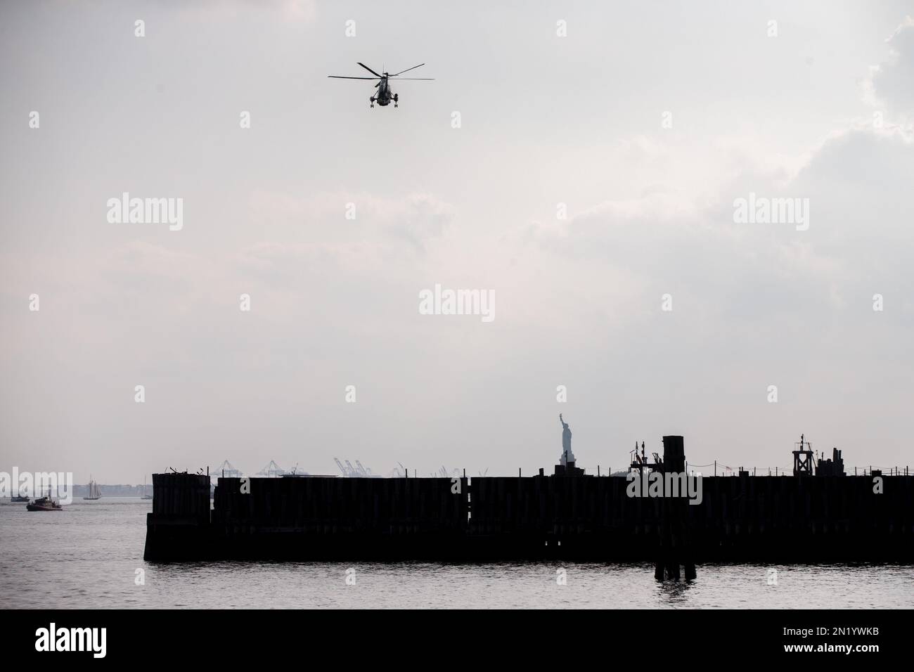 The Statue of Liberty is visible as President Barack Obama departs on