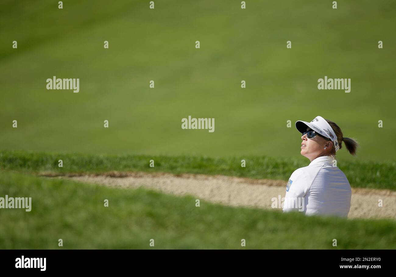 Morgan Pressel prepares to hit out of a bunker up to the 17th green of the Lake Merced Golf Club during the third round of the Swinging Skirts LPGA Classic golf tournament Saturday, April 25, 2015, in Daly City, Calif. (AP Photo/Eric Risberg) Stockfoto