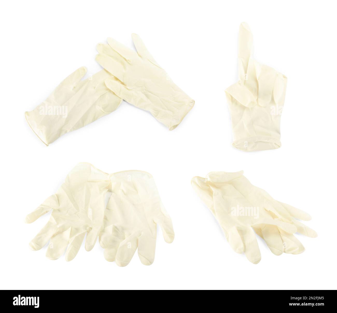 Satz medizinischer Handschuhe auf weißem Hintergrund Stockfoto