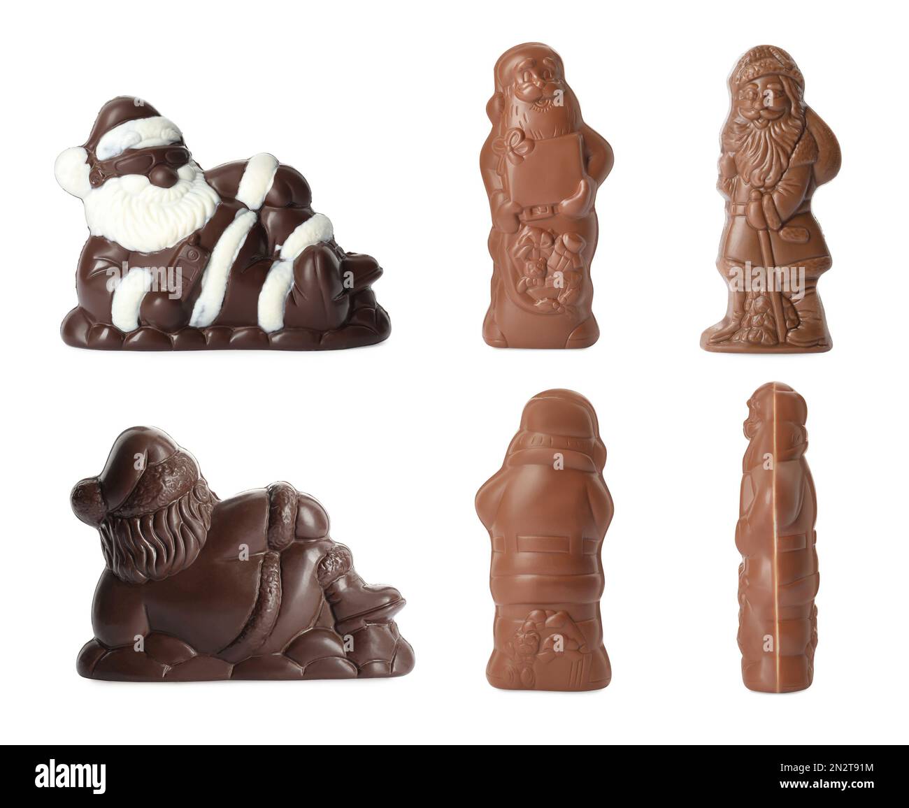 Set mit Weihnachtsmann-Figuren aus Schokolade auf weißem Hintergrund, Blick von verschiedenen Seiten Stockfoto