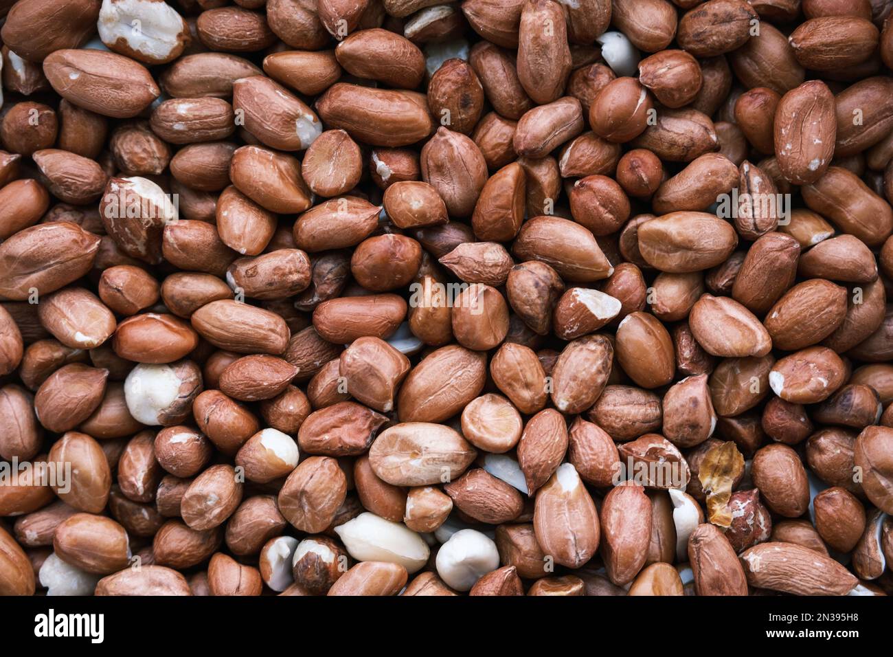 Ein Hintergrundbild von rohen Erdnüssen Stockfoto