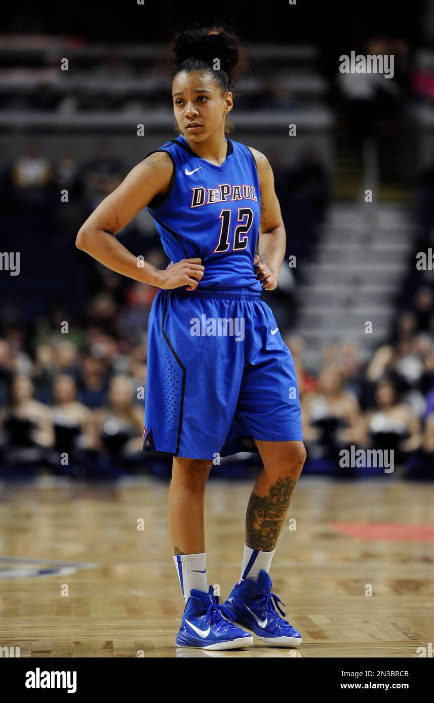 DePaul’s Brittany Hrynko watches play during the second half of an NCAA college basketball game against Connecticut, Friday, Dec. 19, 2014, in Bridgeport, Conn. Connecticut won 98-64. (AP Photo/Jessica Hill) Stockfoto