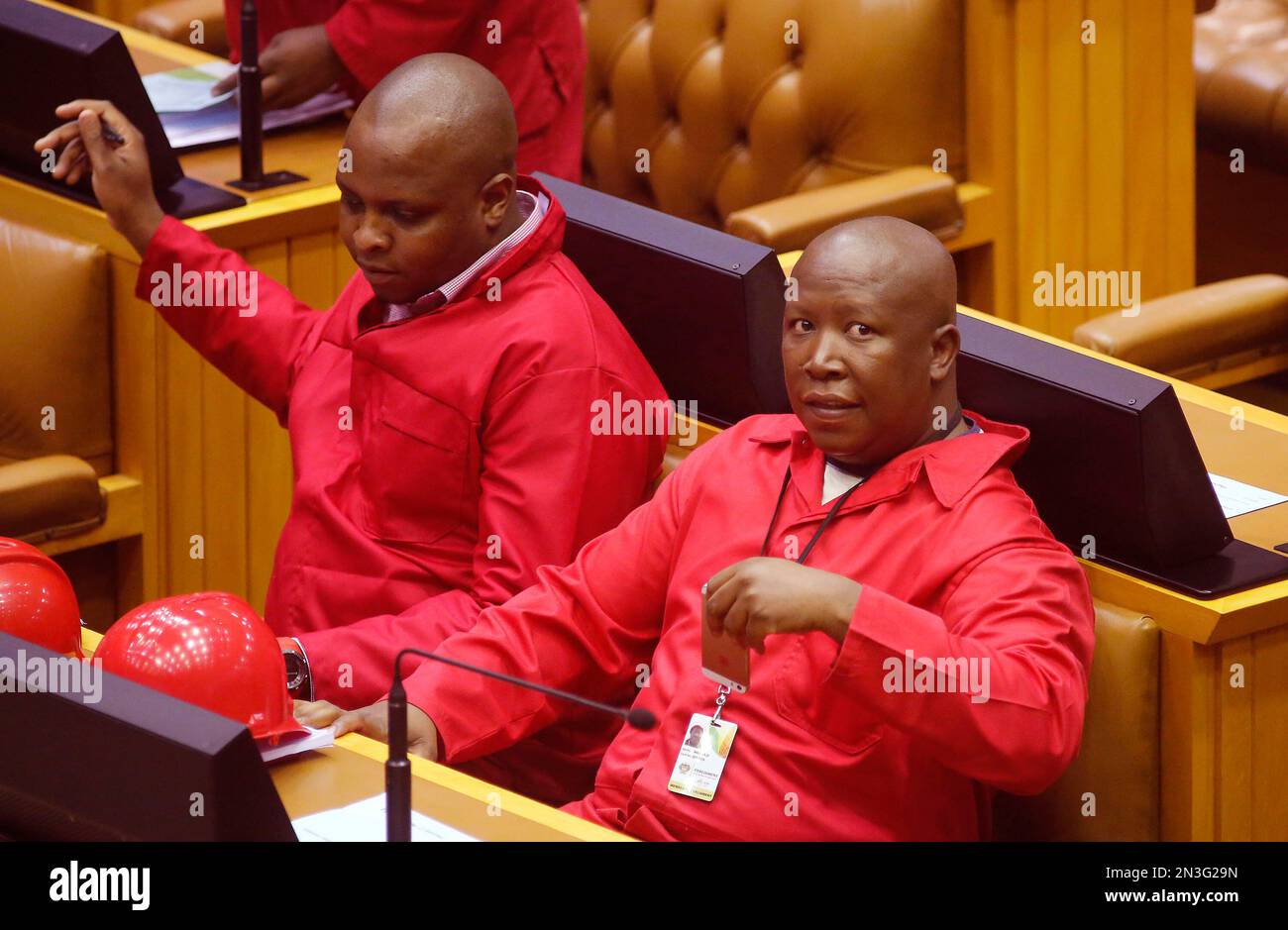 Julius Malema, right, leader of the Economic Freedom Fighters, EFF, sit ...