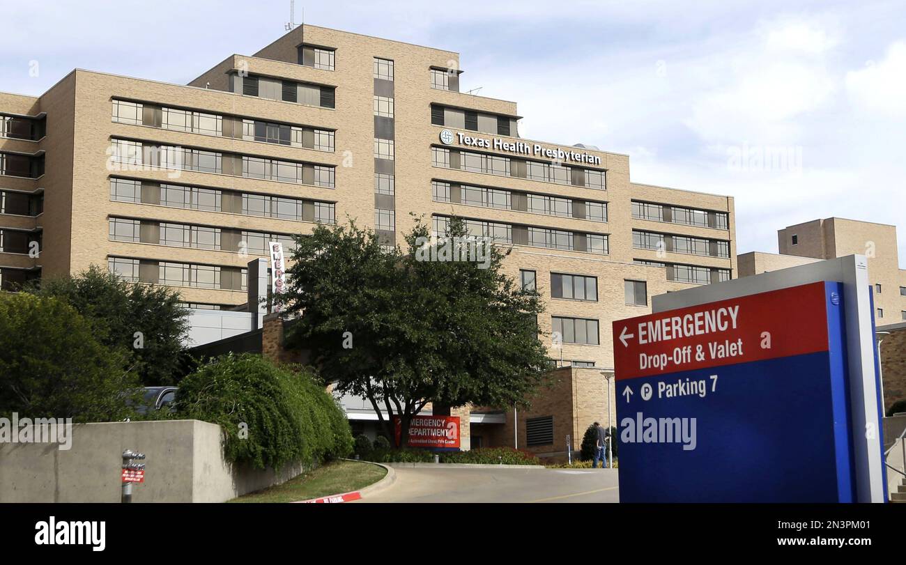 FILE In this Oct. 8, 2014, file photo, a sign points to the emergency