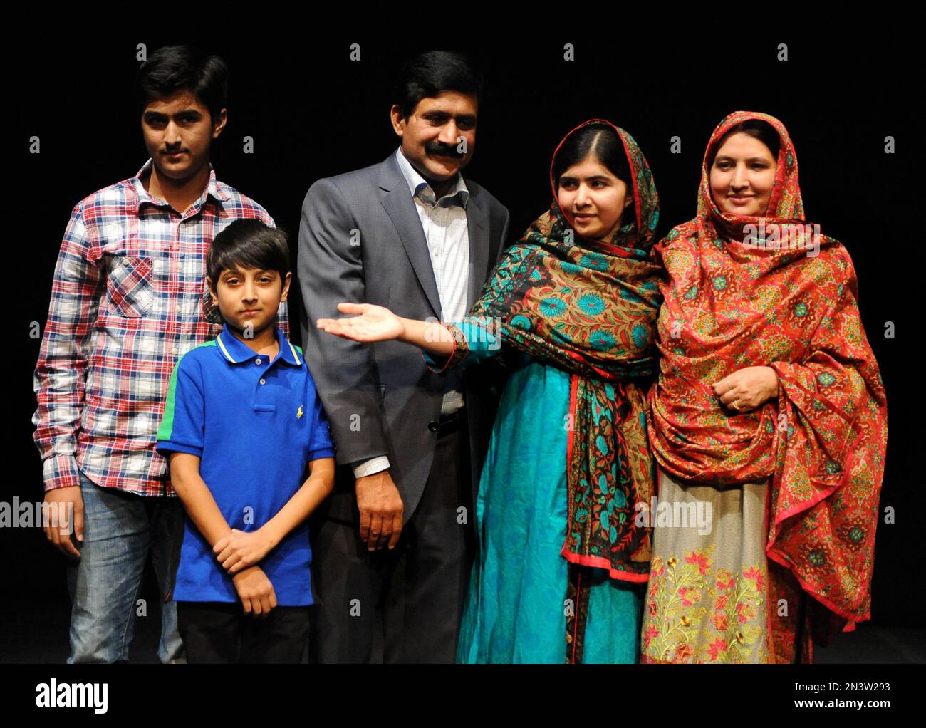 Malala Yousafzai, 2nd right, with mother Tor Pekai, right, brothers