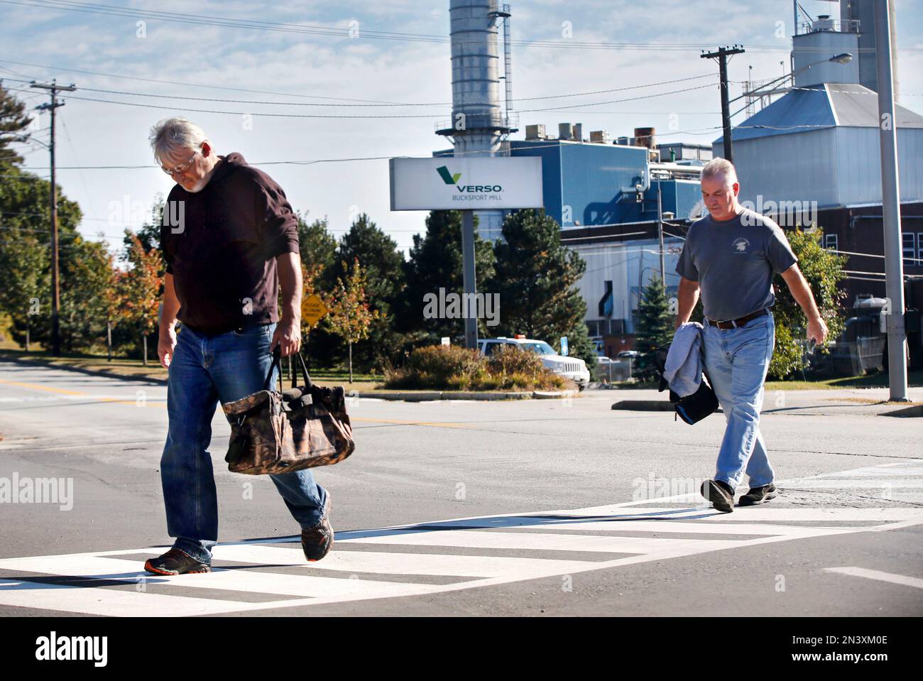 Workers leave the Verso paper mill Thursday, Oct. 2, 2014 in Bucksport
