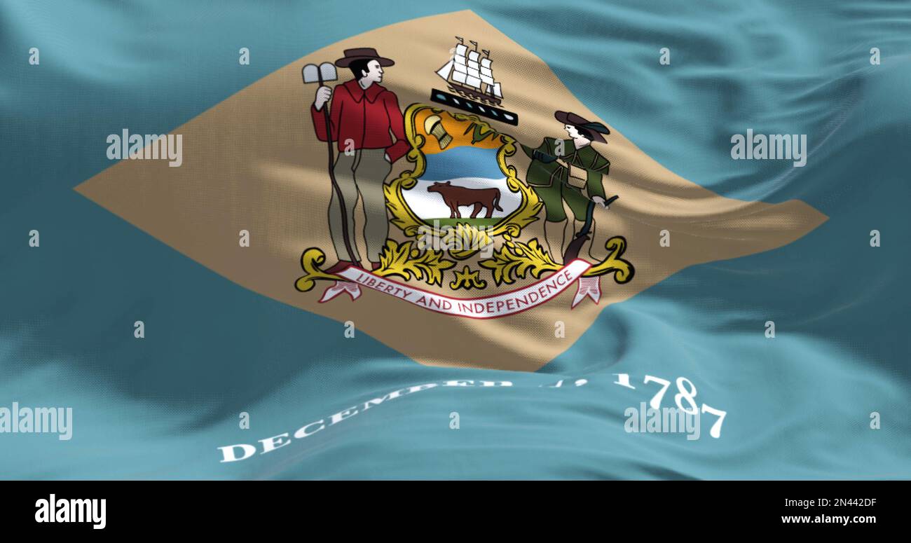 Nahaufnahme der Delaware Staatsflagge, die flattert. Kolonialblauer Hintergrund mit einem bunten Diamanten und Staatswappen, und 7. Dezember 1787 Stockfoto