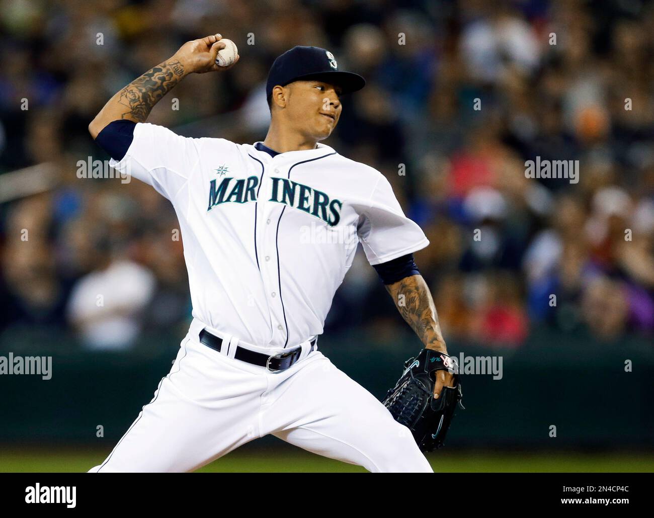 RETRANSMISSION TO CORRECT ID TO TAIJUAN WALKER - Seattle Mariners starting pitcher Taijuan Walker throws against the New York Mets during the third inning of a baseball game, Wednesday, July 23, 2014 in Seattle. (AP Photo) Stockfoto