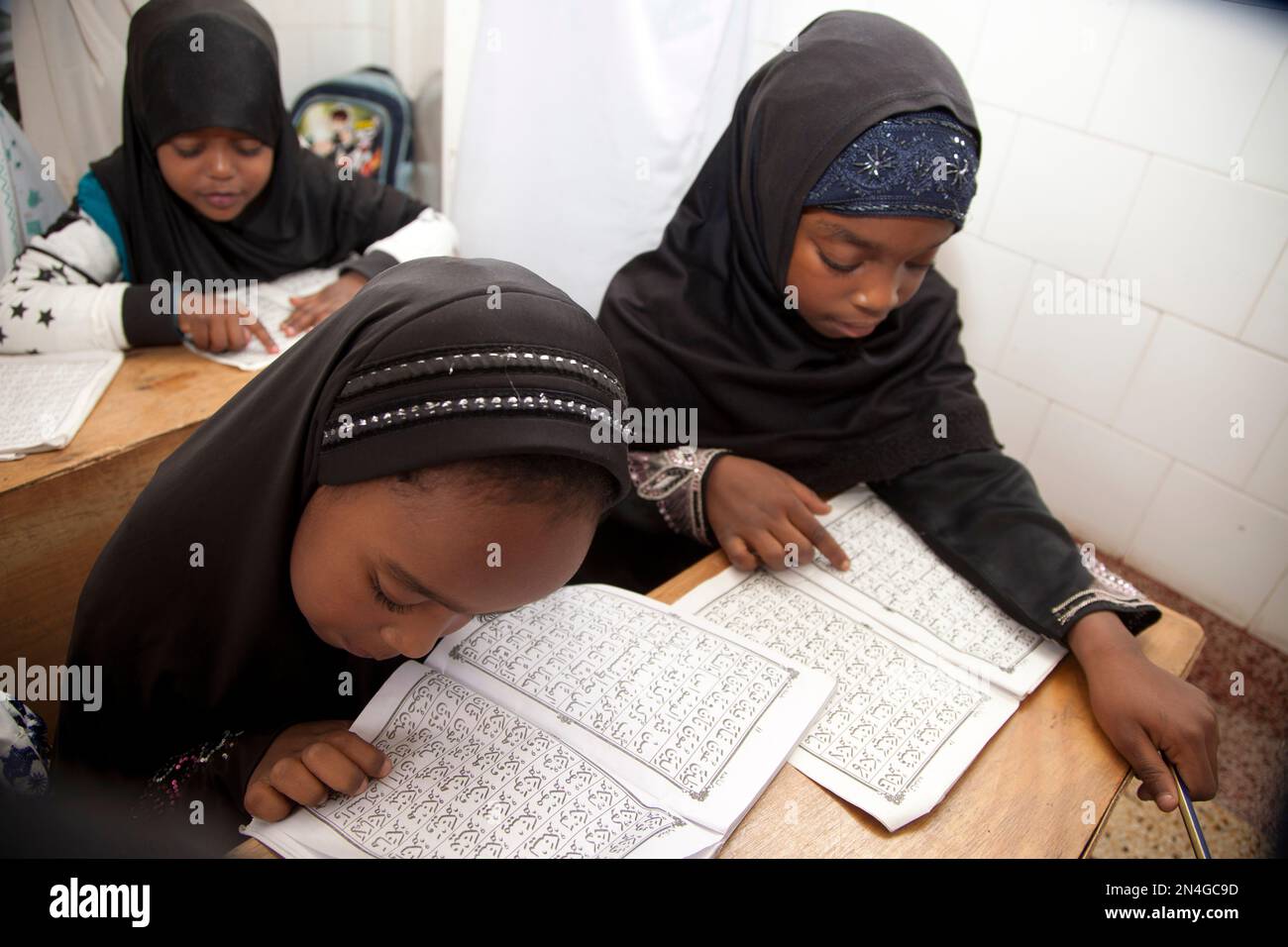 Children recite the Quran at the start of Muslim holy month of Ramadan