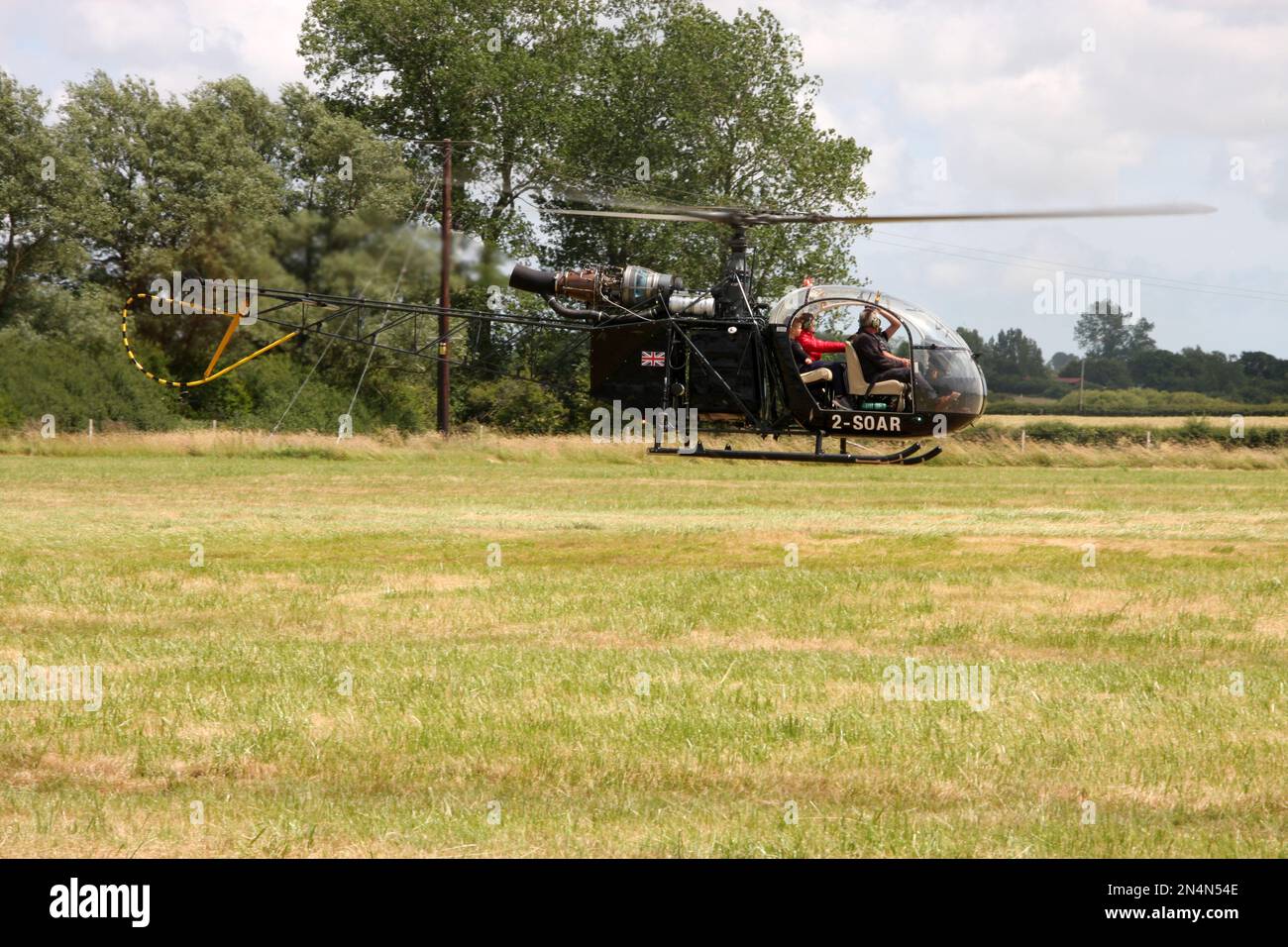 Ein Aerospatiale SA-315/318 Alouette Hubschrauber auf einem privaten Flugplatz in East Sussex Stockfoto