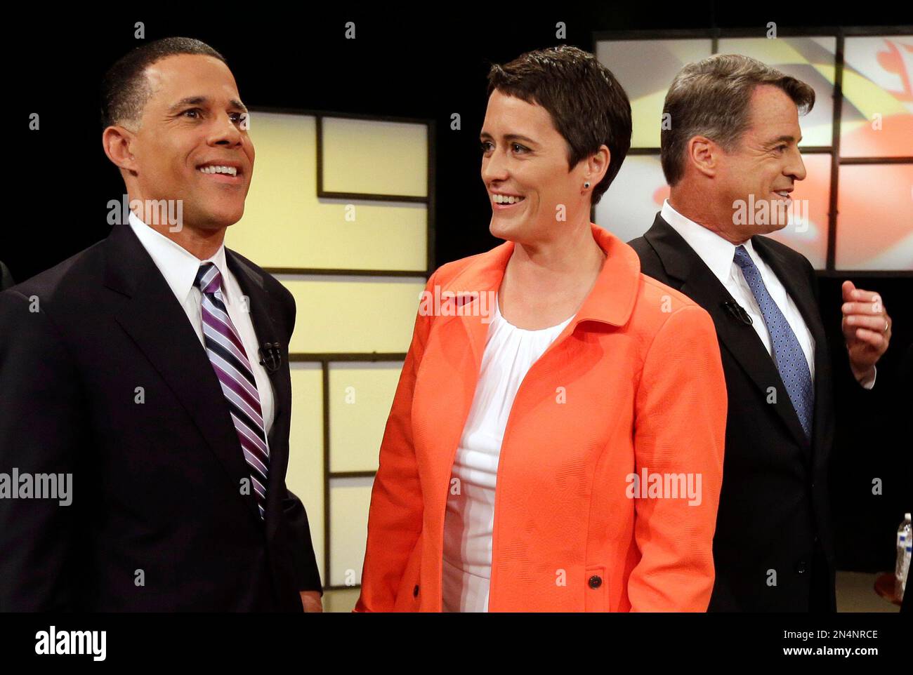 Democratic gubernatorial candidates, from left, Lt. Gov. Anthony Brown, Rep. Heather Mizeur, D-Montgomery, and Attorney General Doug Gansler chat after a Democratic gubernatorial primary debate at Maryland Public Television's studios in Owings Mills, Md., Monday, June 2, 2014. The candidates are competing for a chance to succeed Democratic Gov. Martin O'Malley, who is unable to run for re-election due to term limits. (AP Photo/Patrick Semansky) Stockfoto