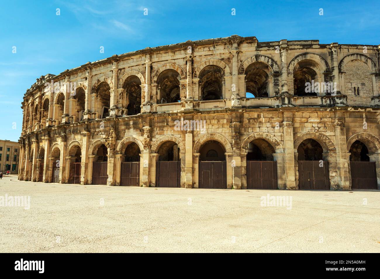 Arena of Nimes, berühmtes Amphitheater des antiken Römischen Reiches in Nimes, Region Occitanie, Südfrankreich Stockfoto