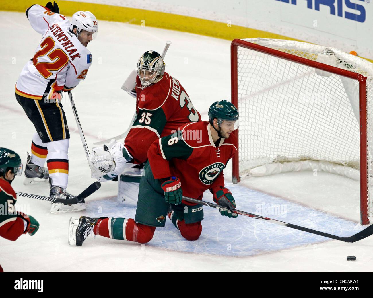 Minnesota Wild Goalie Darcy Kuemper, Center, Looks To Teammate Marco ...