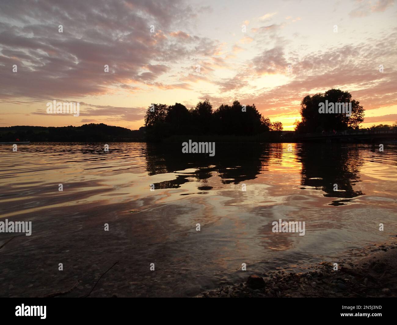 Sonnenuntergang am Waginger See, Bayern Stockfoto