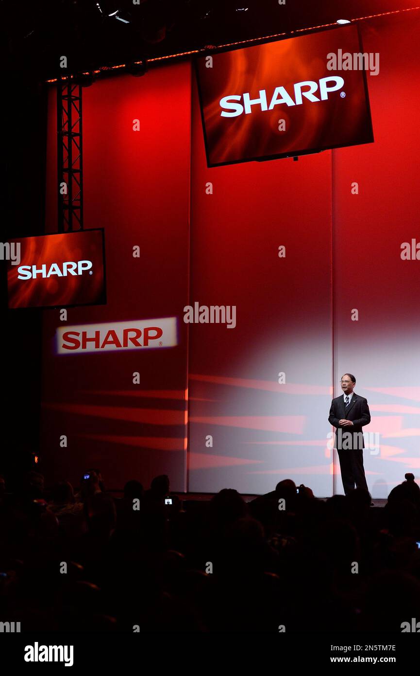 Chairman and CEO of Sharp Electronics Corporation, Toshi Osawa, discusses Sharp's latest innovations at CES on Monday, January 6, 2014 in Las Vegas. (Jeff Bottari/AP Images for Sharp Electronics Corporation) Stockfoto