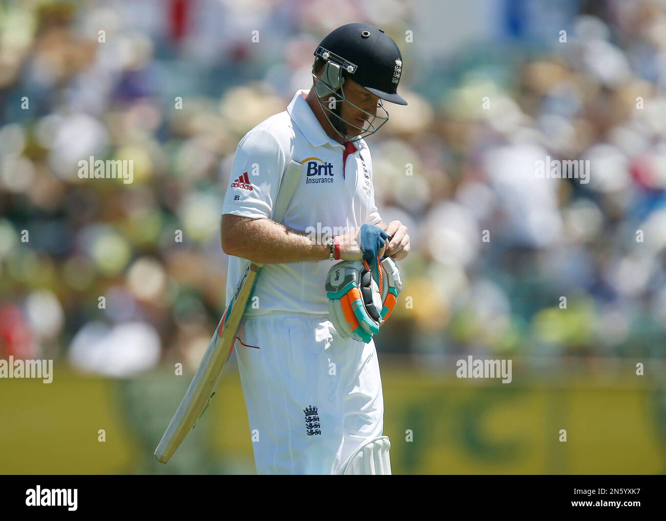 England's Ian Bell walks back to the pavilion after being given out lbw