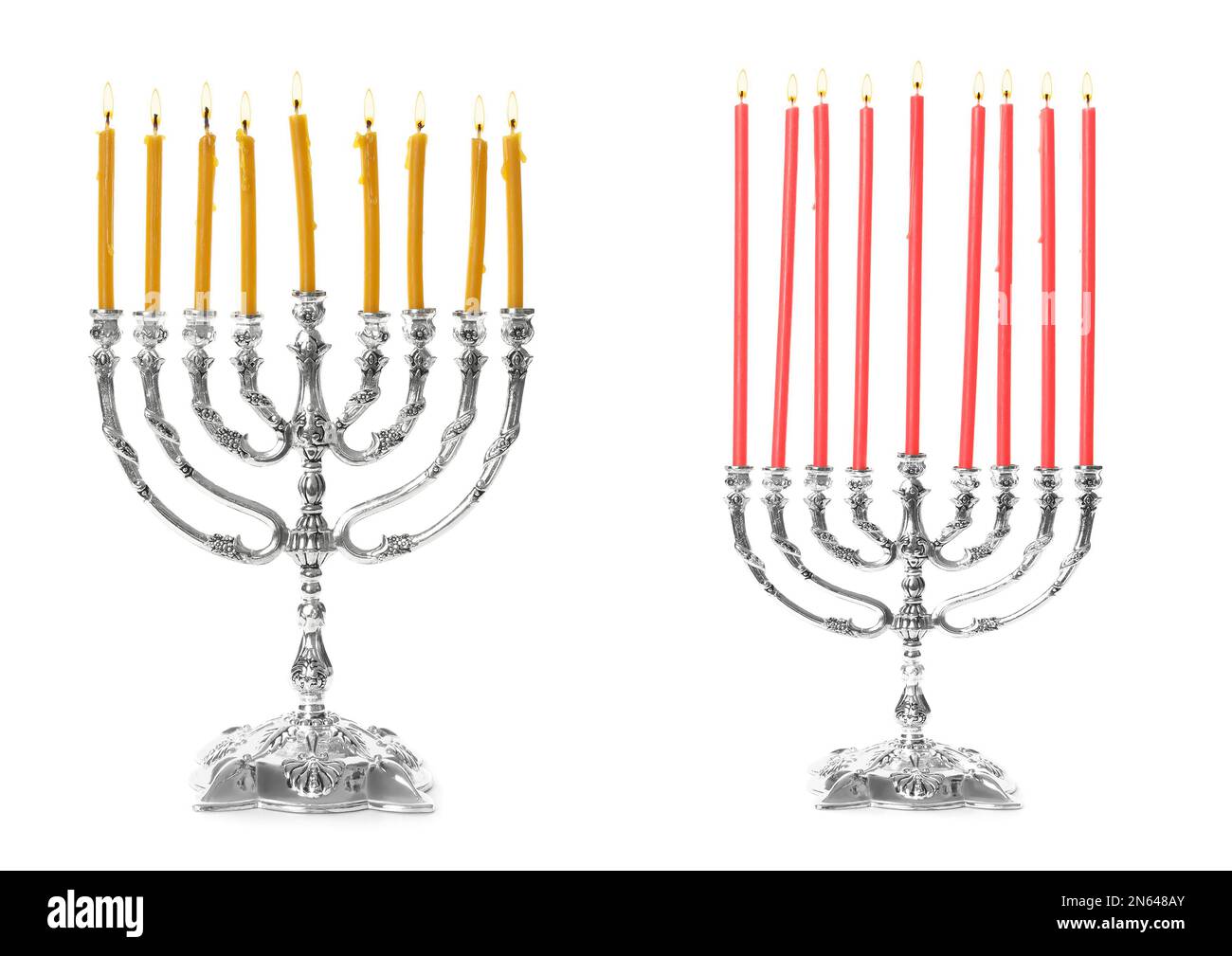 Silberne Menorahs mit brennenden Kerzen auf weißem Hintergrund. Hanukka-Feier Stockfoto