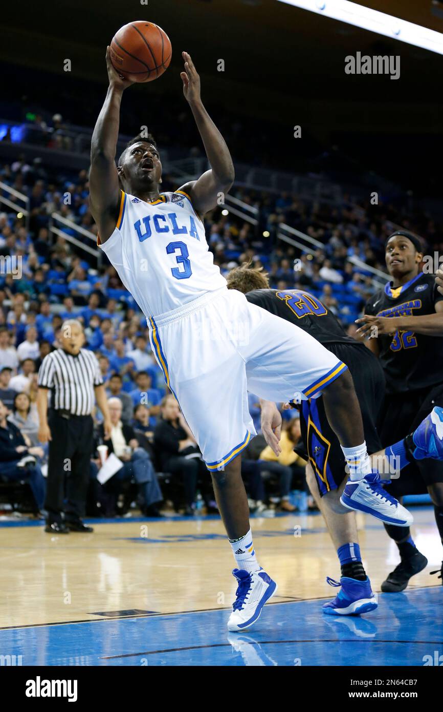 UCLA's Jordan Adams shoots the ball against Morehead State during a Las Vegas Invitational regional NCAA college basketball game, Friday, Nov. 22, 2013, in Los Angeles. UCLA won 81-70. (AP Photo/Danny Moloshok) Stockfoto