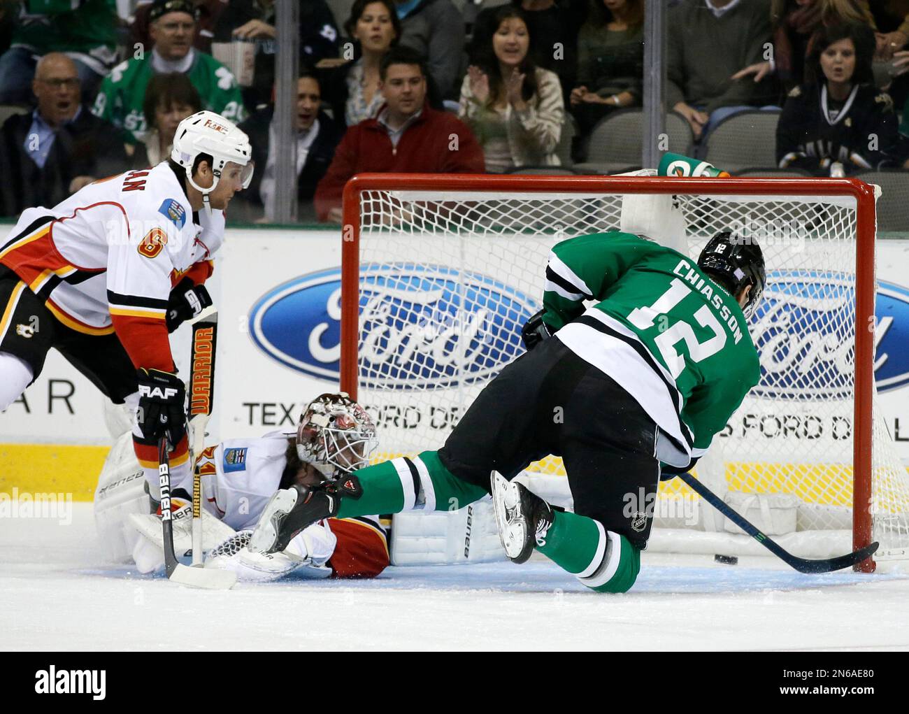 Calgary Flames defenseman Dennis Wideman (6) and goalie Karri Ramo