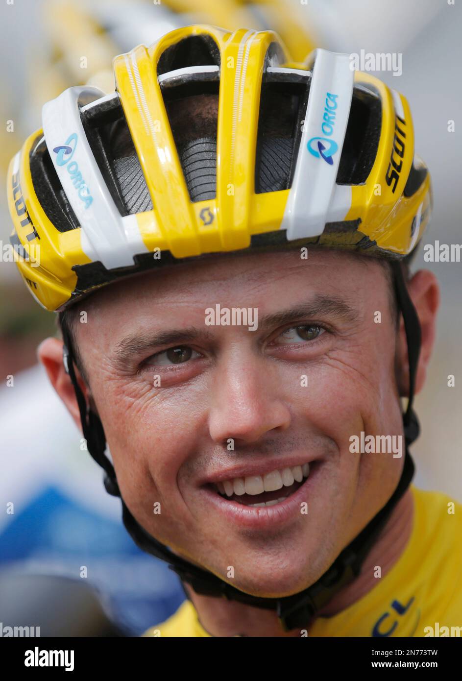 Simon Gerrans of Australia, wearing the overall leader's yellow jersey, waits for the start of the fifth stage of the Tour de France cycling race over 228.5 kilometers (142.8 miles) with start in Cagnes-sur-Mer and finish in Marseille, southern France, Wednesday July 3, 2013. (AP Photo/Christophe Ena) Stockfoto