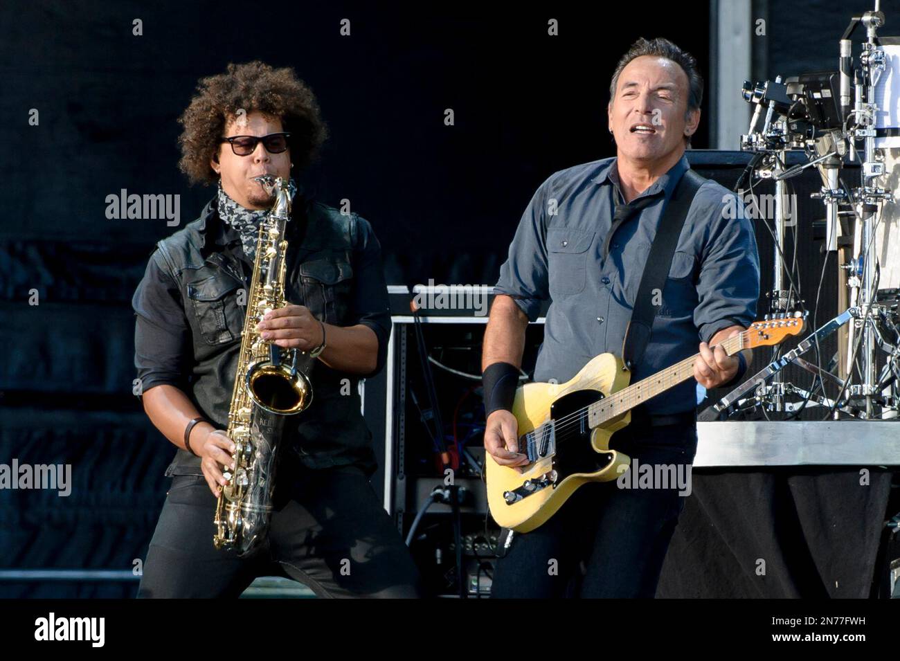 Bruce Springsteen, right, performs with Jake Clemons, left, nephew of