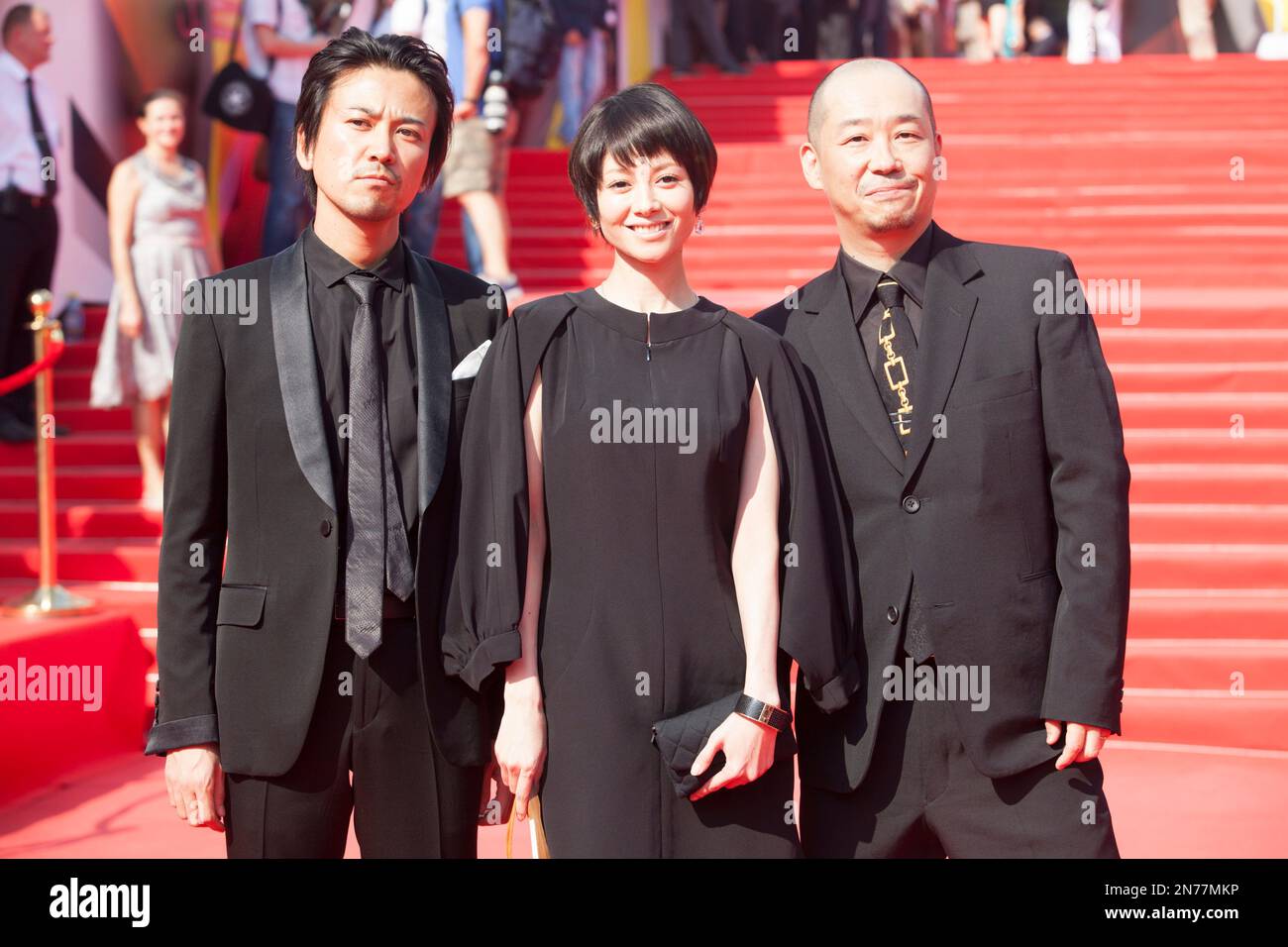 From Left Japanese Actors Shima Onishi Yoko Maki And Film Director From Left Japanese Actors Shima Onishi Yoko Maki And Film Director Tatsushi Omori Pose On The Red Carpet At The Closing Ceremony Of The 35th Moscow Film Festival In Moscow Russia On Saturday June 29 2013 Omori Got A Special Prize For His Film The Ravine Of Goodbye Ap Photo Alexander Jr 2n77mkp 