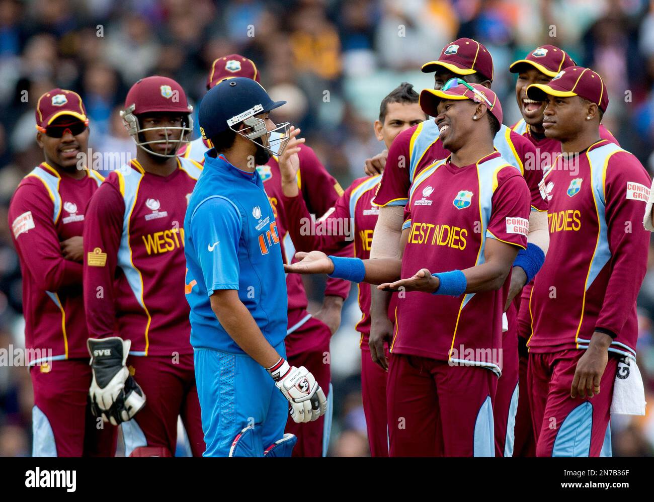 West Indies' Captain Dwayne Bravo, Fourth Right, Gestures As They Watch ...