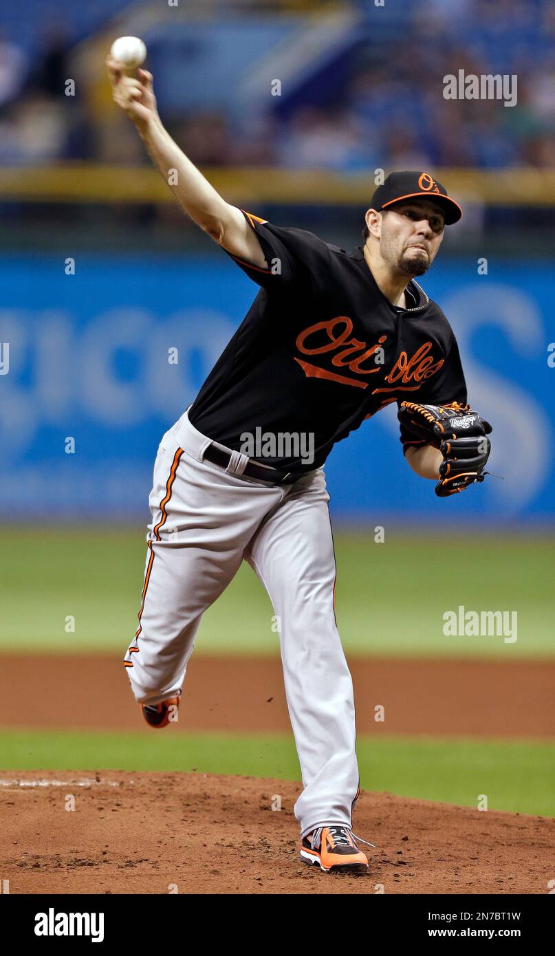 Baltimore Orioles starting pitcher Jason Hammel delivers to a Tampa Bay Rays batter during the first inning of a baseball game Friday, June 7, 2013, in St. Petersburg, Fla. (AP Photo/Chris O'Meara) Stockfoto