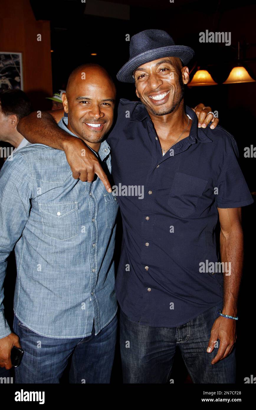 Actors Dondre Whitfield and James Lesure attend Marcus Allen Foundation 2013 Celebrity Invitational Poker Tournament on Sunday, June 2nd, 2013 at Lucky Strike Hollywood in Los Angeles, California. (Photo by Arnold Turner/Invision/AP) Stockfoto