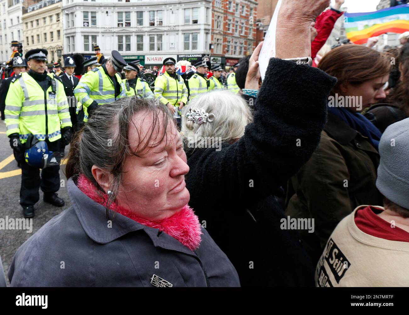 demonstrators-turn-their-backs-in-protest-as-the-union-jack-draped