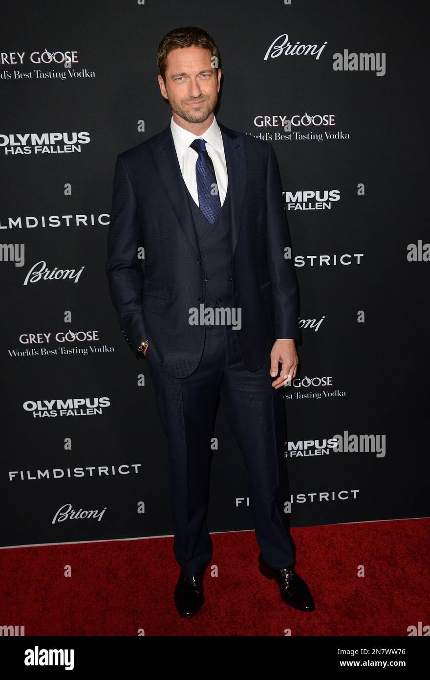 Gerard Butler arrives at the LA premiere of "Olympus Has Fallen" at the ArcLight Theatre on Monday, March 18, 2013 in Los Angeles. (Photo by Jordan Strauss/Invision/AP) Stockfoto
