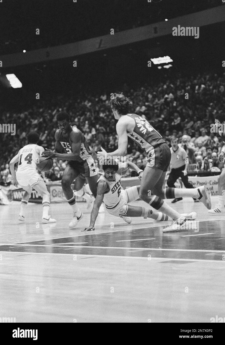 New Jersey Net Bernard King, left, comes away with a stolen ball as