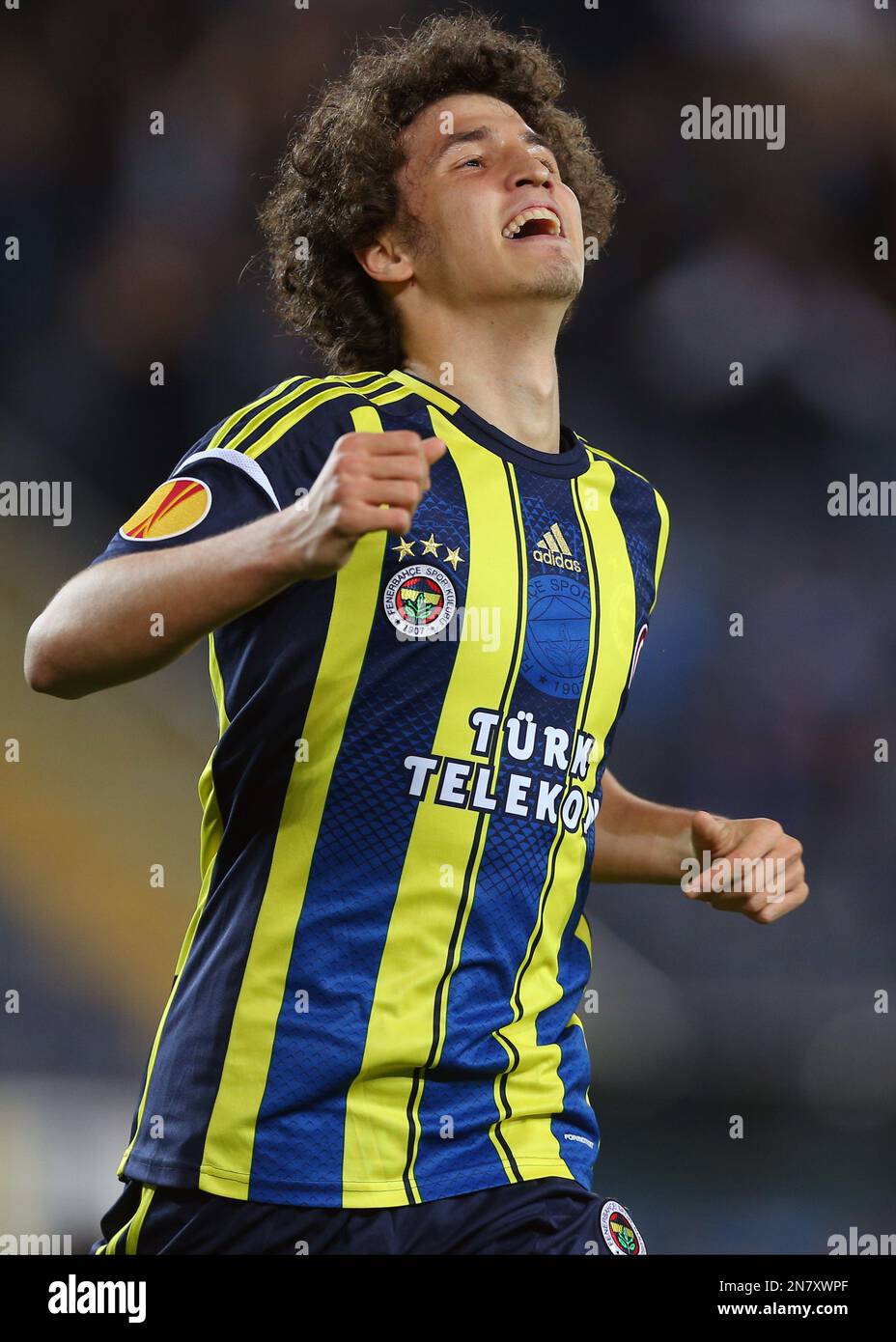 Fenerbahce's Salih Ucan celebrates his goal during their Europa League Round of 16 second leg soccer match with FC Viktoria Plzen at Sukru Saracoglu Stadium in Istanbul, Turkey, Thursday, March 14, 2013. The game is being played without spectators because of a ban slapped on Fenerbahce by UEFA. (AP Photo) Stockfoto