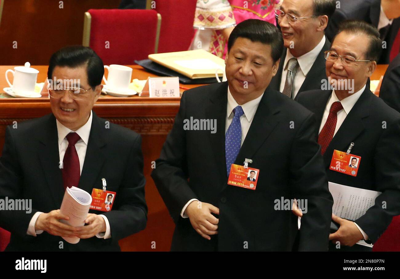 Communist Party chief Xi Jinping, center, Chinese President Hu Jintao