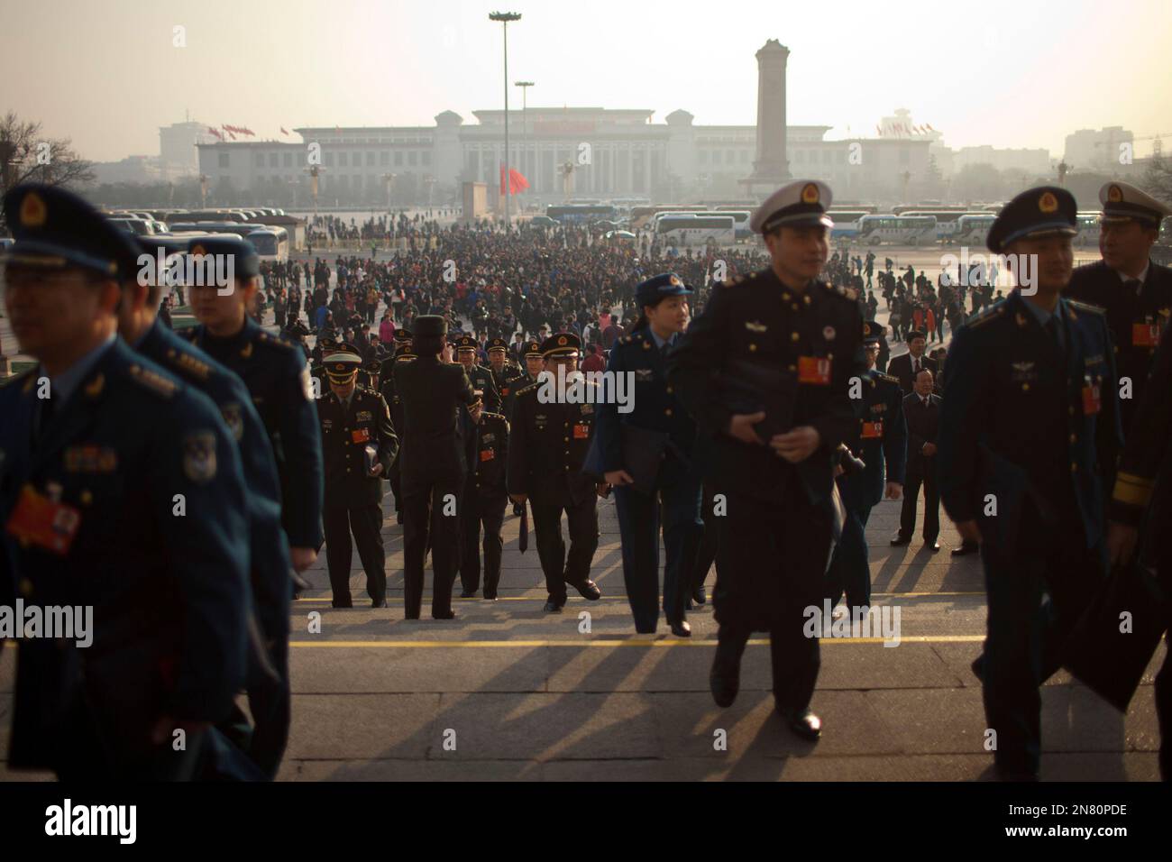 Delegates from Chinese People's Liberation Army walk to the Great Hall ...