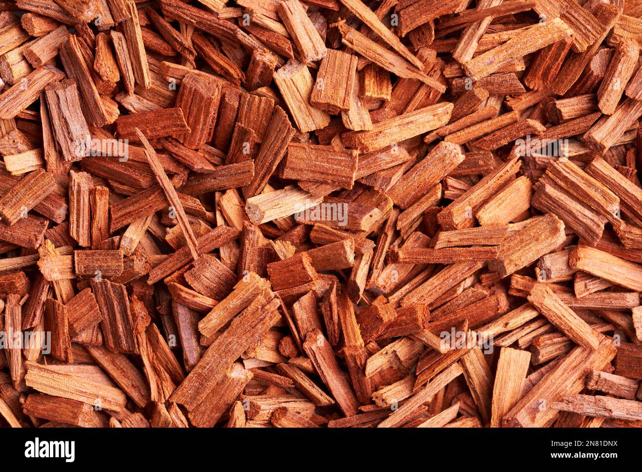 Strukturierter Hintergrund - rote Sandalholzspäne Stockfoto