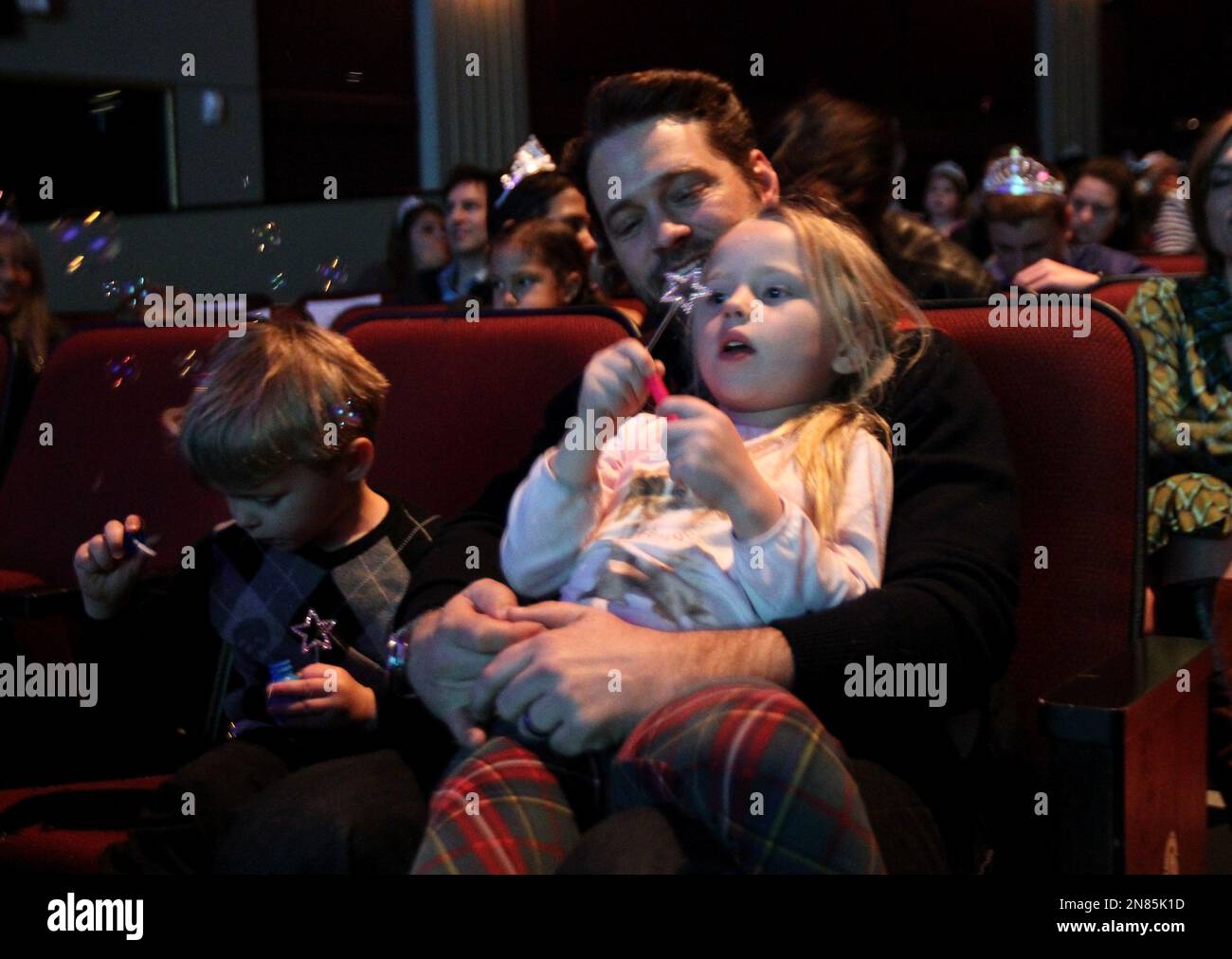 Jason Priestley, center, and his children Dashiell Priestley, left, and