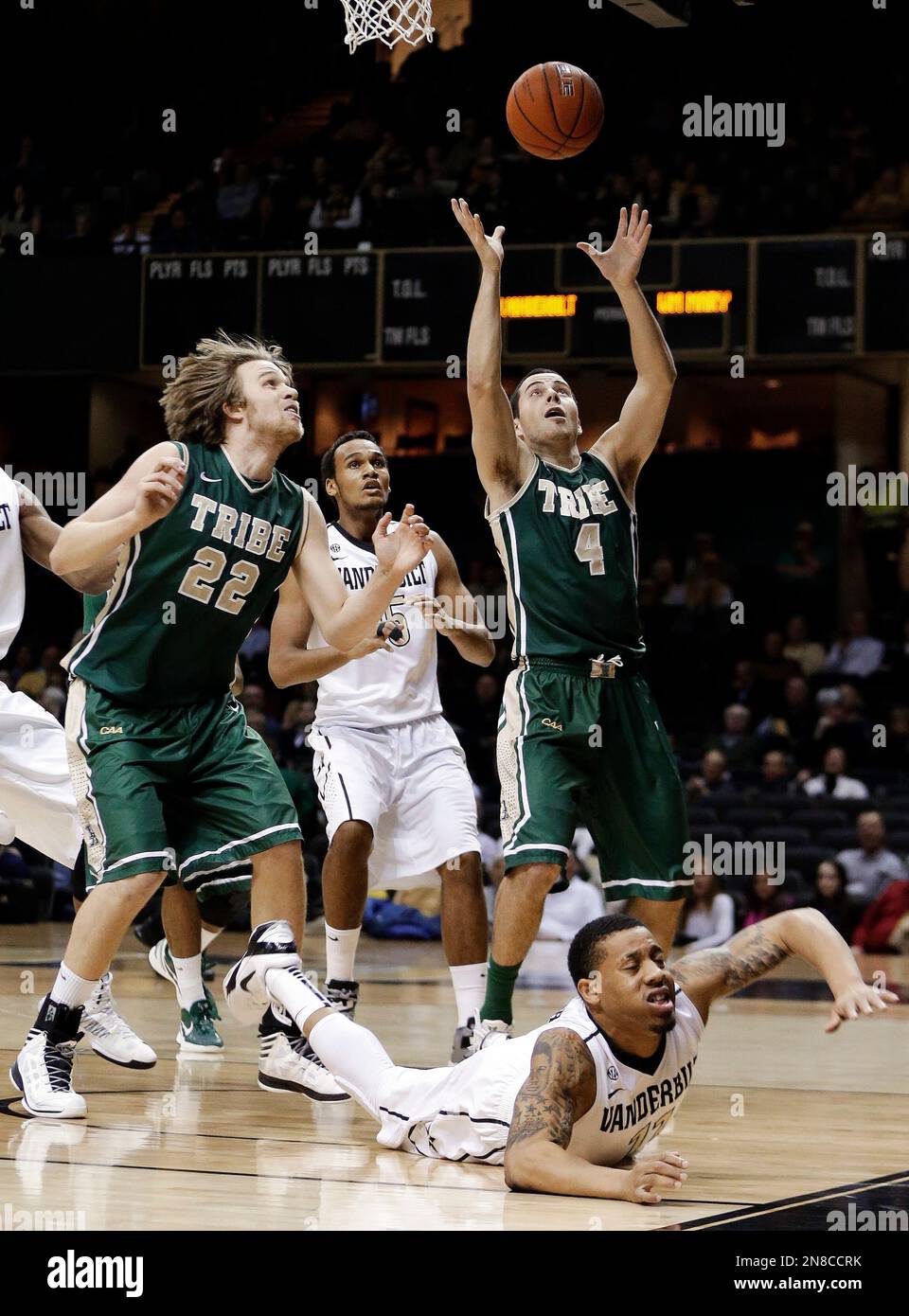 Tim Rusthoven Vanderbilt guard Kyle Fuller falls to the court after missing a shot as ...