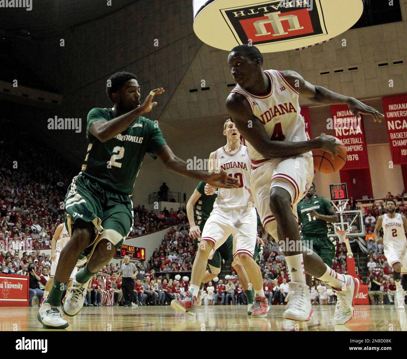 Indiana s victor oladipo 4 makes a pass to cody zeller 40 while