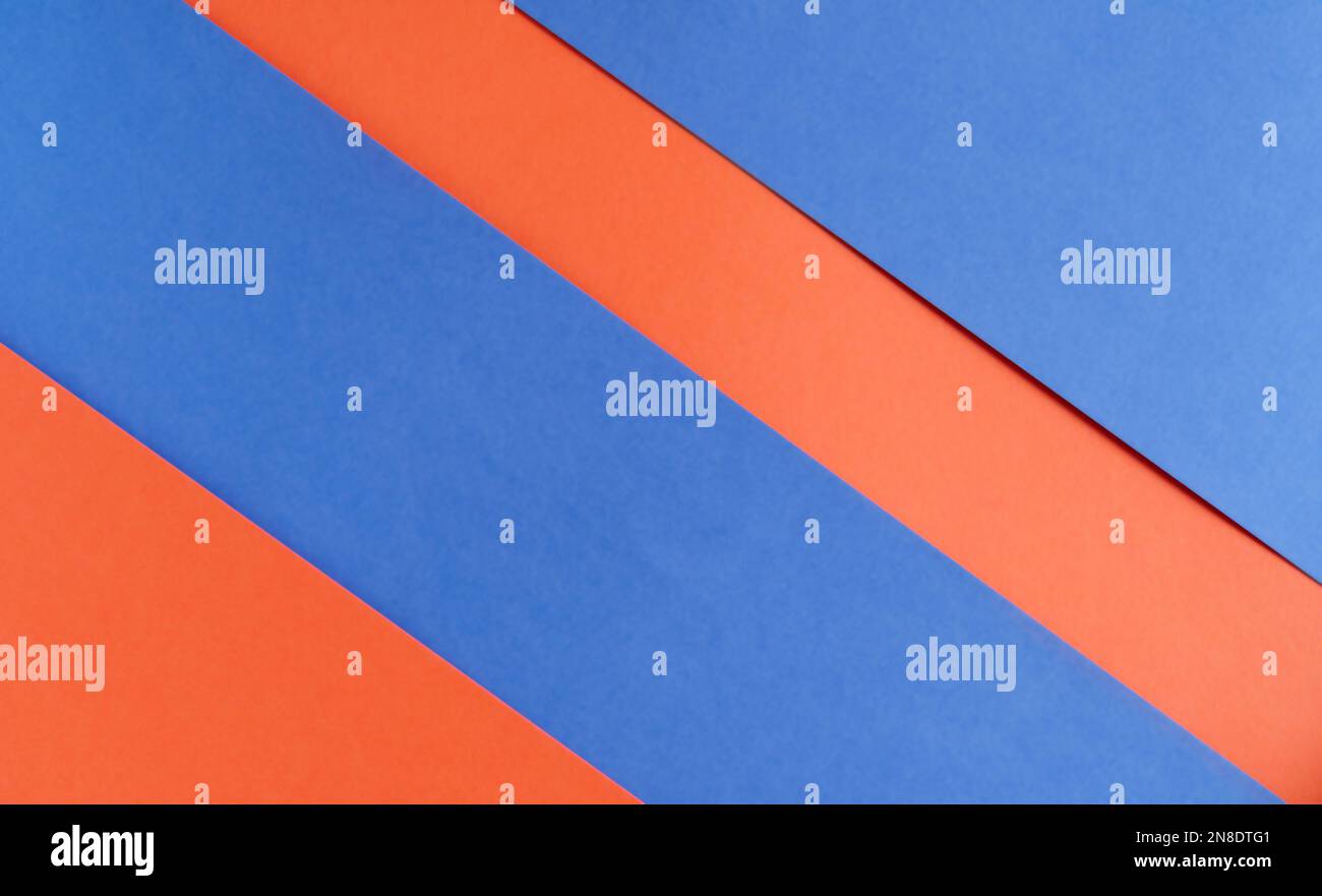 Hintergrund aus blauem und rotem Papier in Pastellfarben, geometrisches Muster Stockfoto