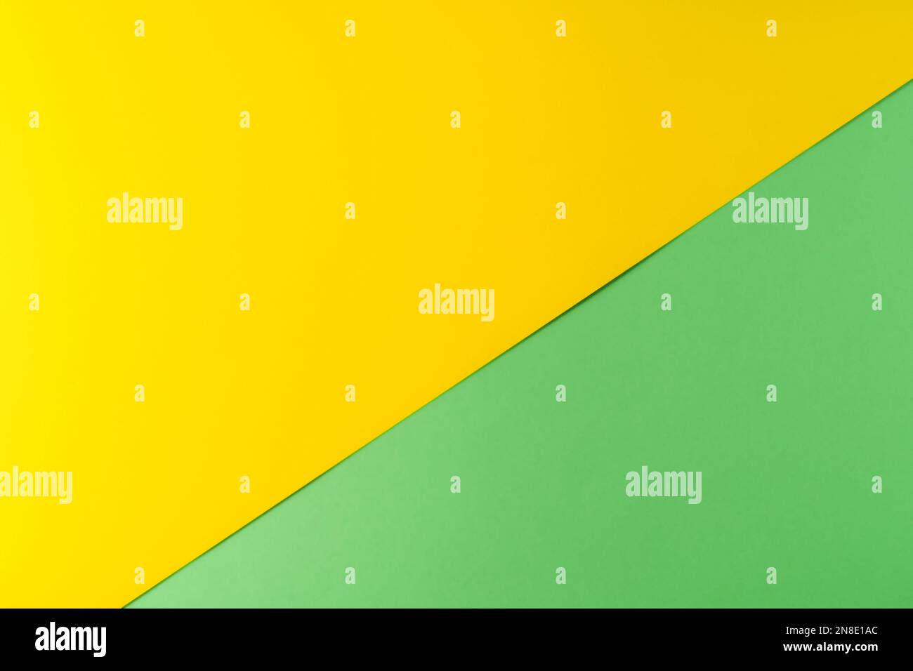 Hintergrund: Grün und gelb strukturiertes Papier in Pastellfarben, geometrisches Muster Stockfoto