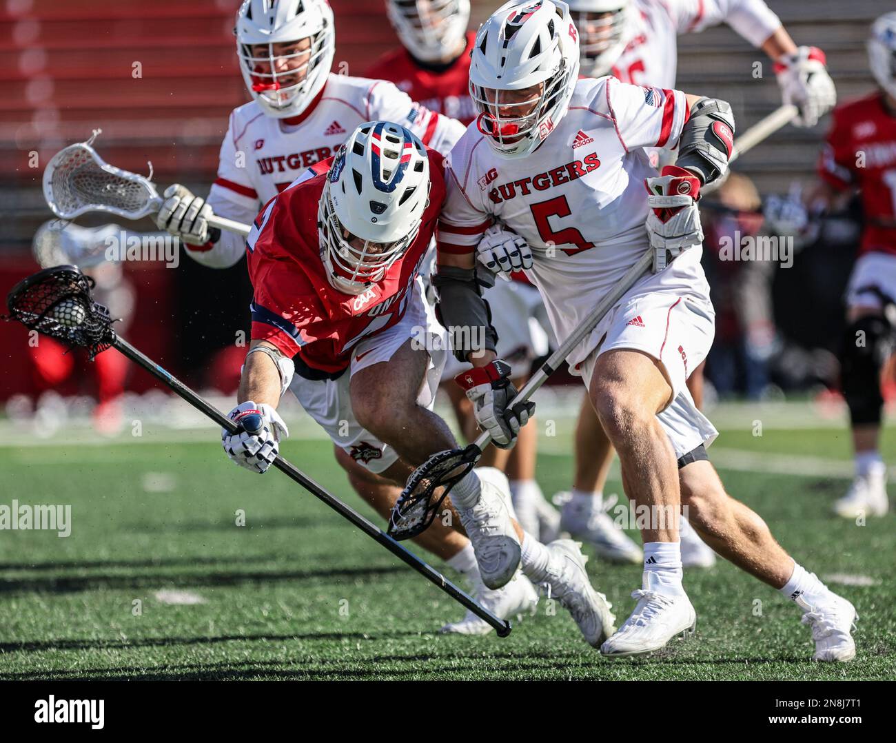 11. Februar 2023 Rutgers attackiert Ross Scott (5) versucht, den