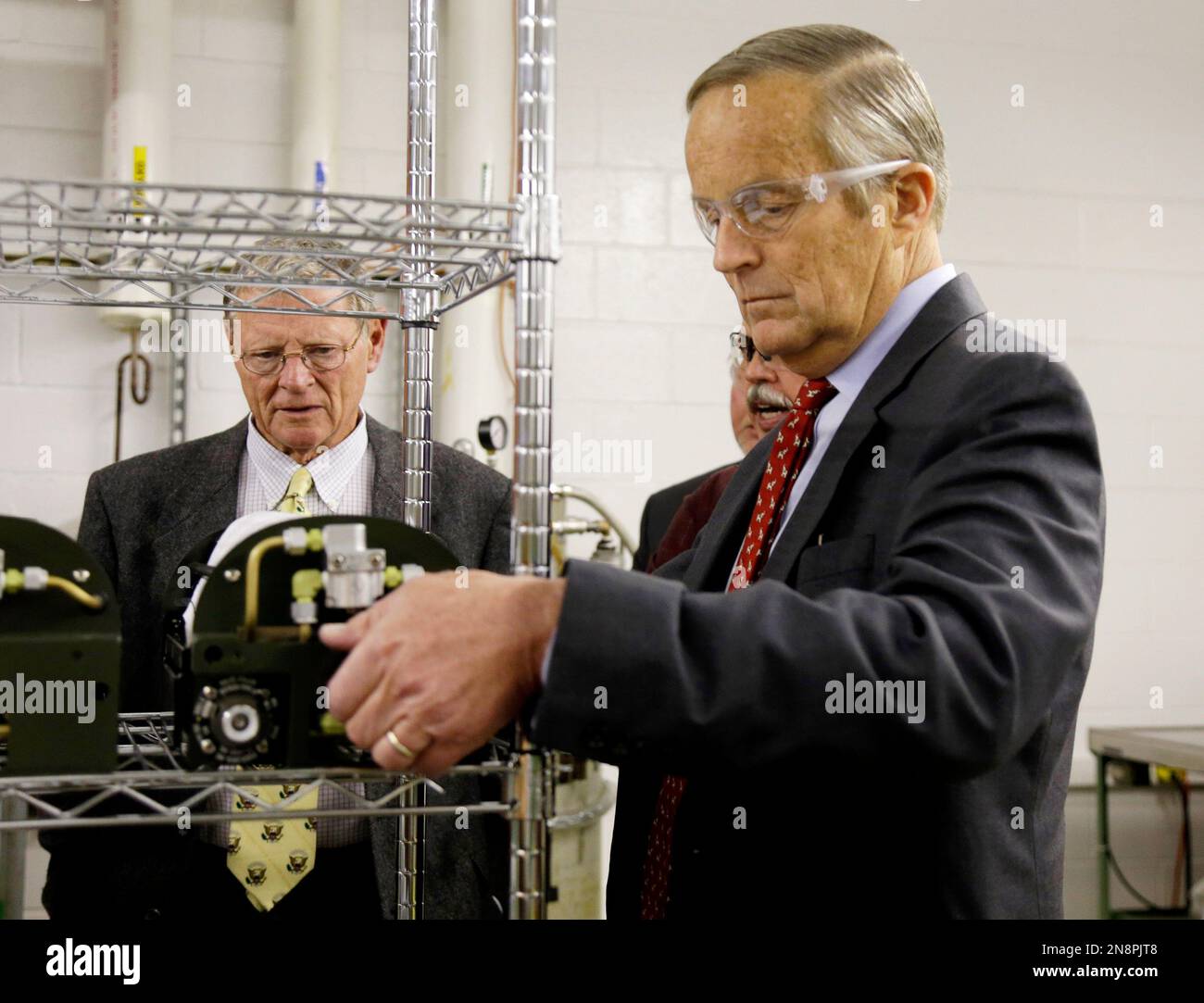 Missouri Senate candidate, Rep. Todd Akin, RMo., picks up a portable