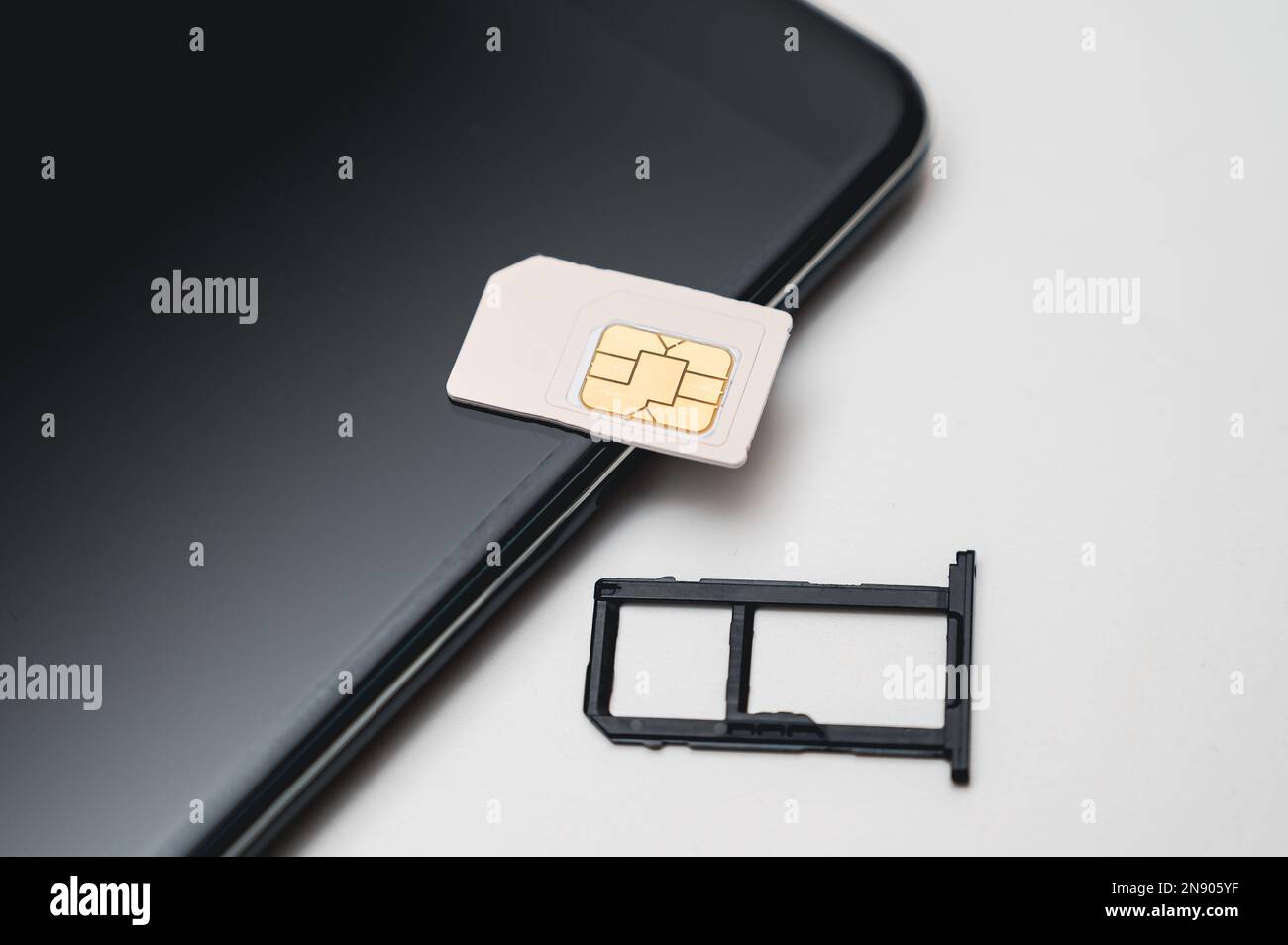 Austausch der SIM-Karte im Telefon. Mobile Simcard Stockfoto