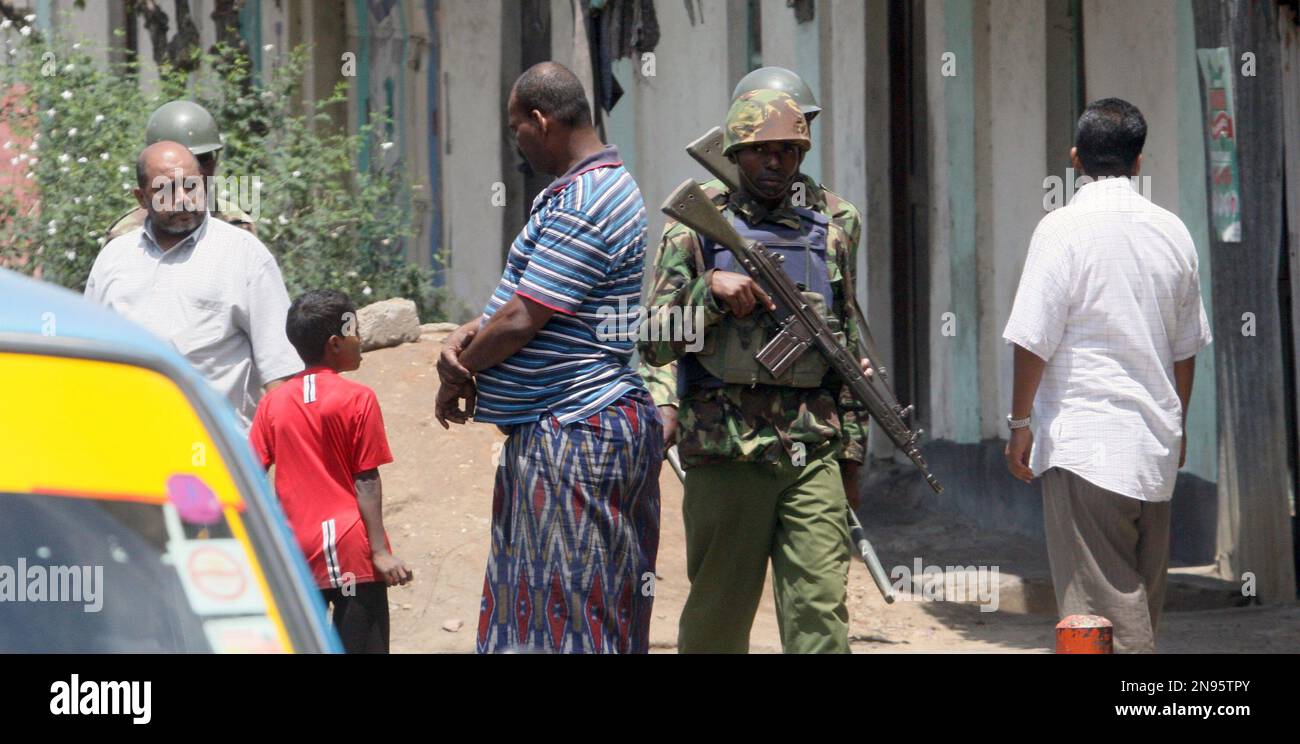 A Kenyan Paramilitary troops patrol on foot in Mombasa , Friday, Aug ...