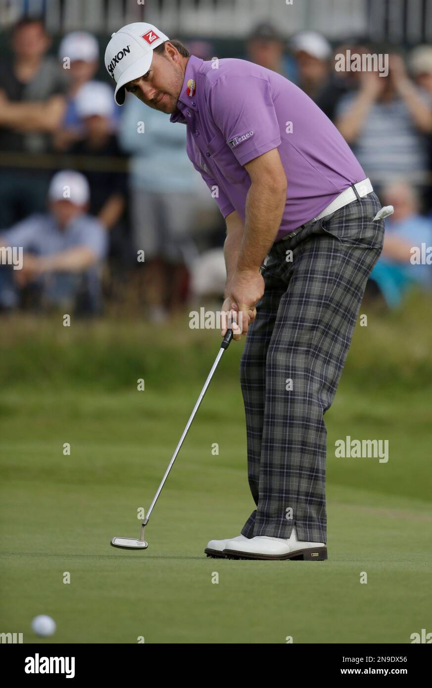 Graeme McDowell of Northern Ireland putts on the 15th green at Royal Lytham & St Annes golf club during the third round of the British Open Golf Championship, Lytham St Annes, England, Saturday, July 21, 2012. (AP Photo/Chris Carlson) Stockfoto