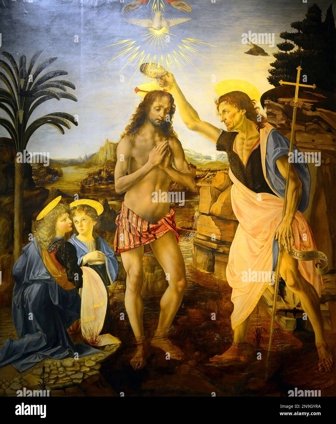 Die Taufe Christi, gemalt von der italienischen Renaissance-Malerin Andrea del Verrocchio und allgemein ihm und seinem Schüler Leonardo da Vinci zugeschrieben. Stockfoto